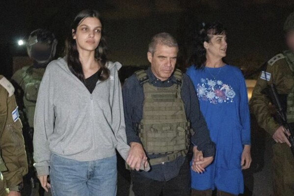 Israel-Hamas war live updates: Hamas frees 2 US hostages | AP News